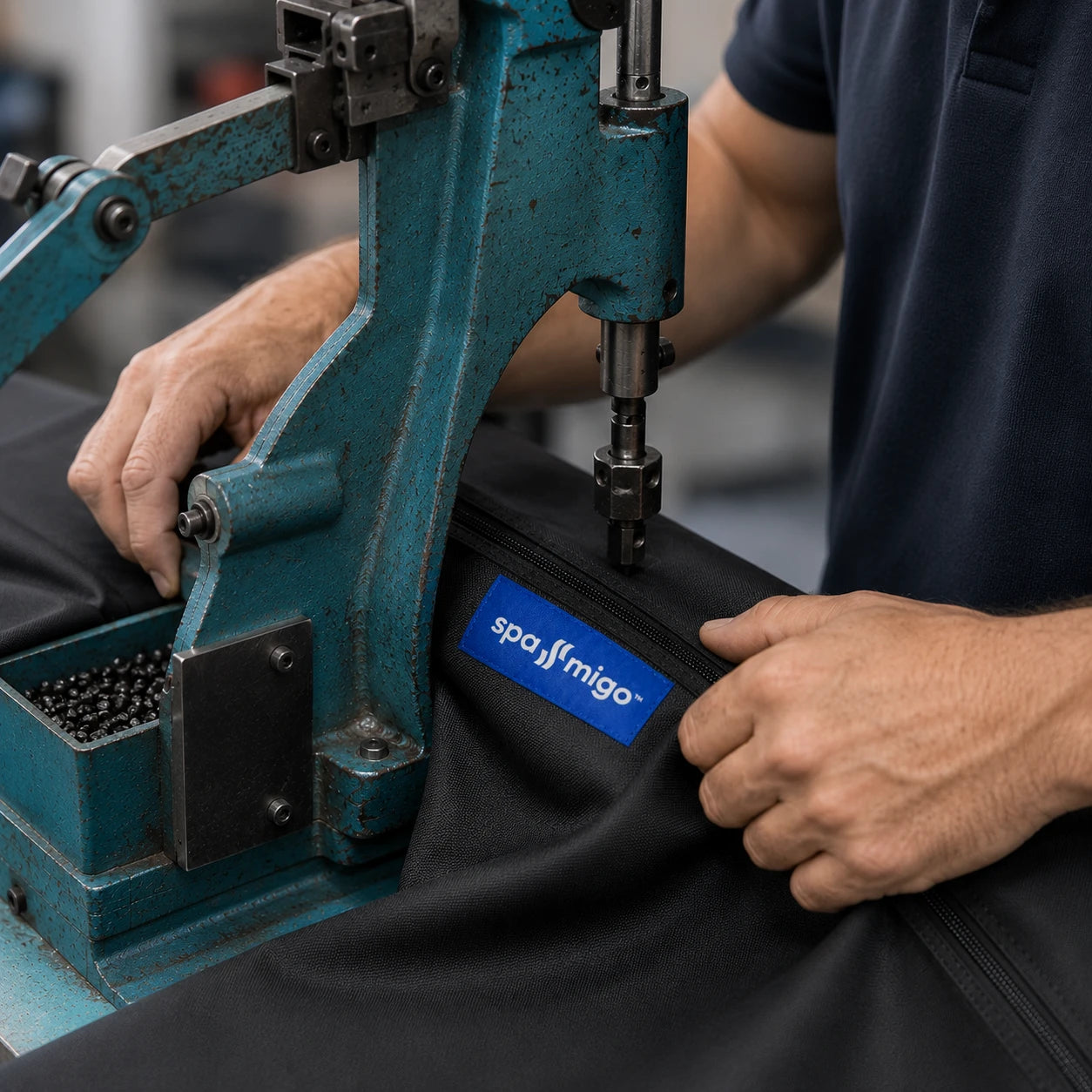Hardware being set on a Spa-Migo cover by hand