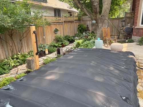 Customer photo review of a Rollaway swim spa cover
